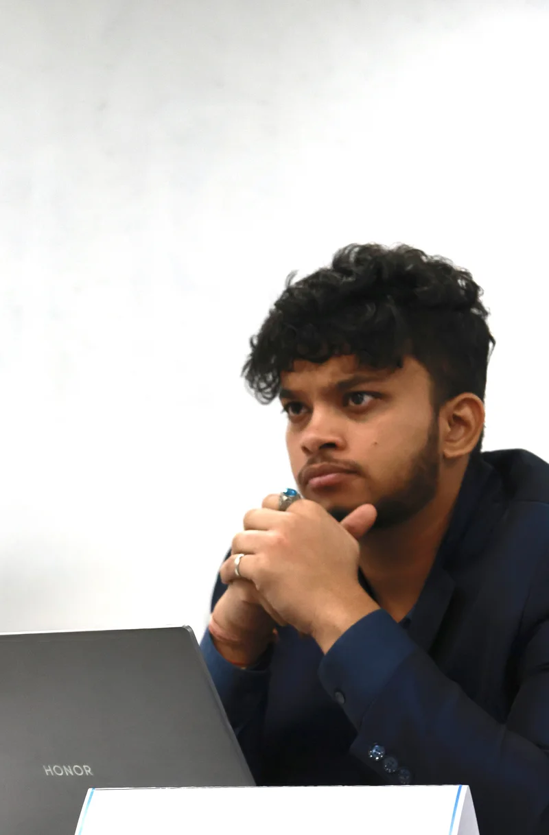 Ripunjay Kashyap working at his laptop